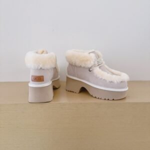 UGG Platform shearling ankle snow boots