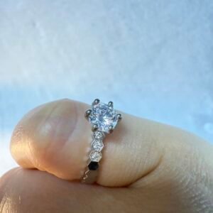 Chaumet Ring with big stone and mini stones